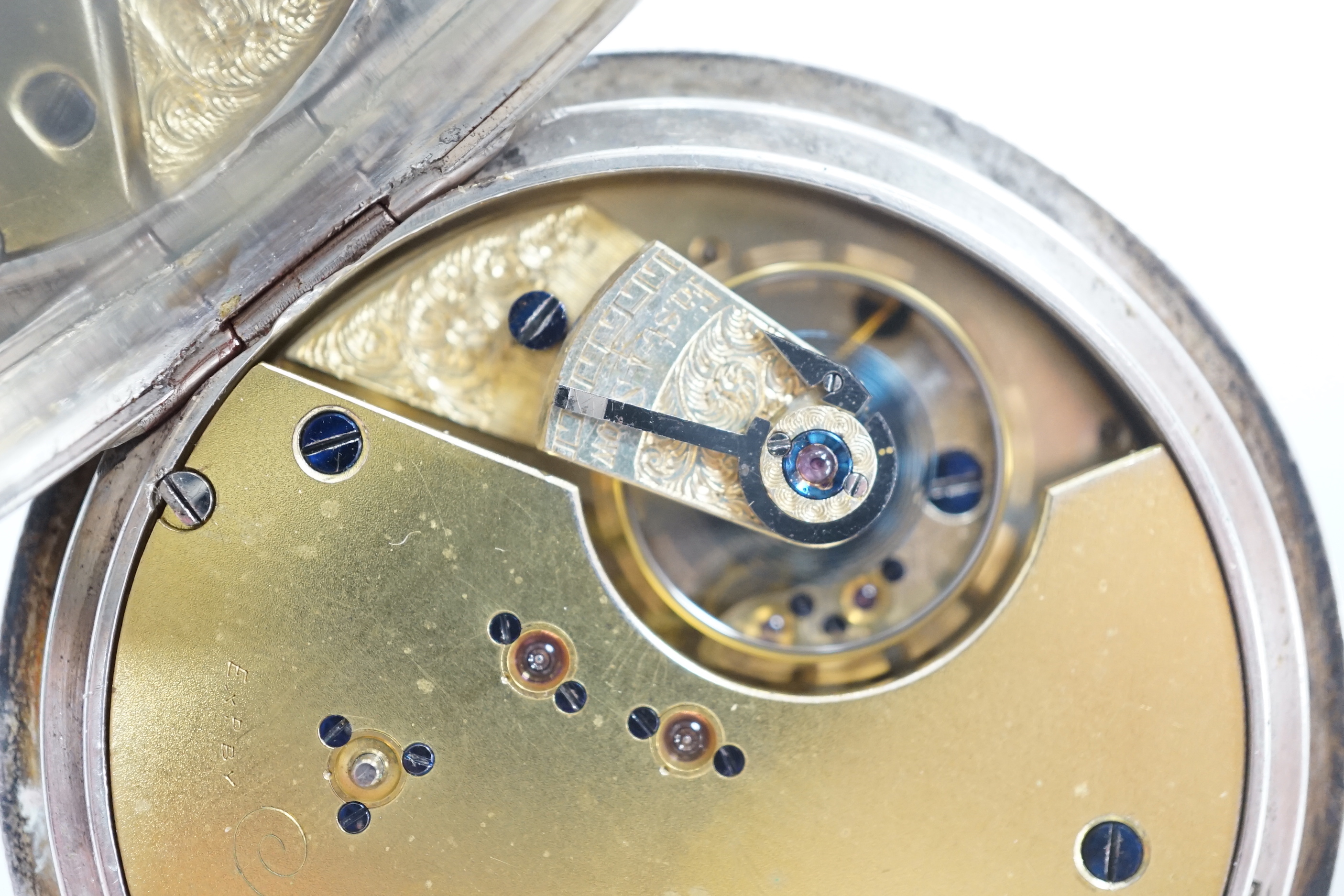 A Swiss white metal cased open faced chronograph pocket watch, by M. Ruff, Porth, with Roman dial.